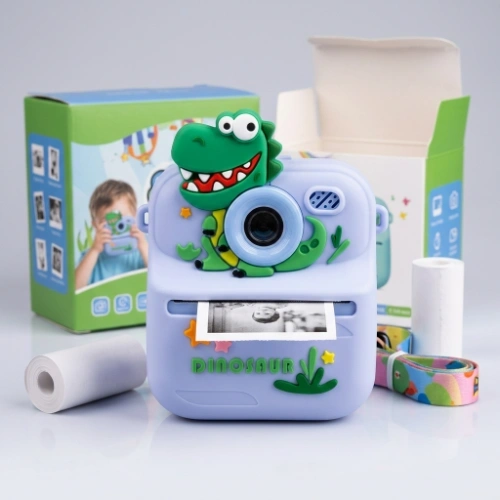 Plavo-zeleni dečiji fotoaparat sa motivom dinosaurusa i ugrađenim štampačem